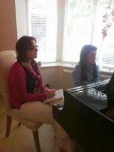 cat teaching pic piano lessons reading